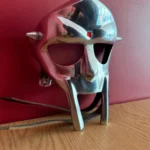 MF DOOM-Inspired Chrome Mask – Spiked Villain Aesthetic with Red Gem & Leather Straps | Hip-Hop Icon Tribute | Collector’s Edition